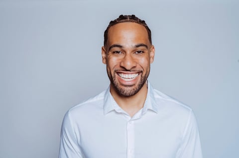 Cheerful young businessman smiling
